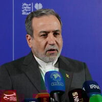 Iranian Foreign Minister Abbas Araghchi speaks in a news briefing after attending a conference titled "International Law Under Assault: Aggression and Self-Defense," in Tehran, Iran, November 16, 2025. (AP Photo/Vahid Salemi)