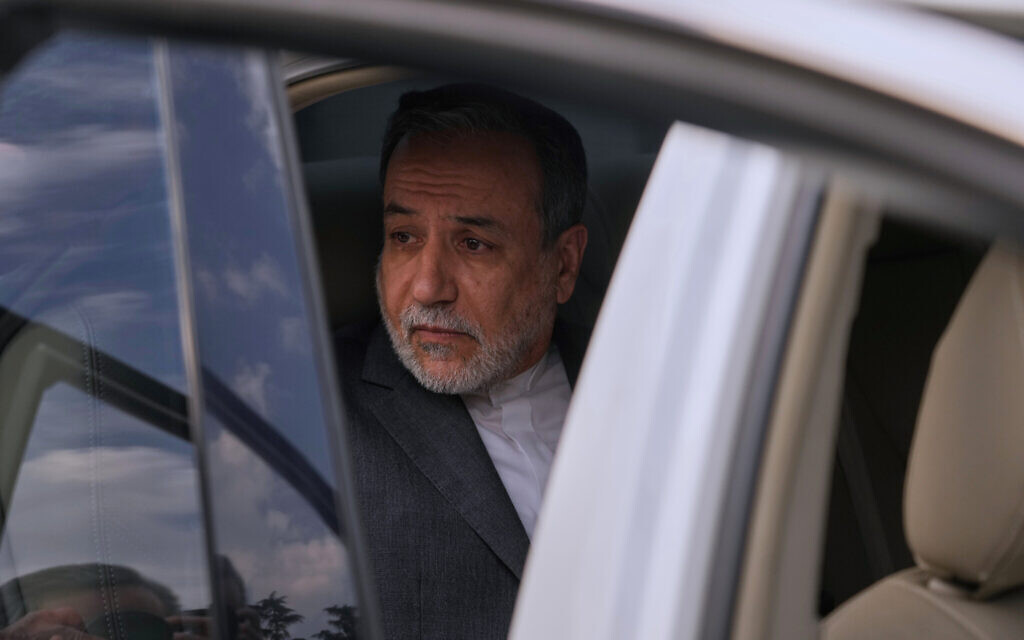 Iranian Foreign Minister Abbas Araghchi leaves after attending a conference titled 'International Law Under Assault: Aggression and Self-Defense,' in Tehran, Iran, Sunday, Nov. 16, 2025. (AP Photo/Vahid Salemi)