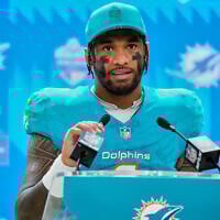 Miami Dolphins quarterback Tua Tagovailoa attends a press conference after an NFL football game between the Washington Commanders and the Miami Dolphins in Madrid, Spain, November 16, 2025. (AP Photo/Manu Fernandez)
