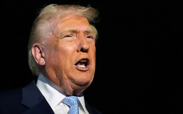 US President Donald Trump speaks to reporters before boarding Air Force One at Palm Beach International Airport in West Palm Beach Fla., on his way back to the White House, Sunday, Nov. 16, 2025. (AP Photo/Manuel Balce Ceneta)