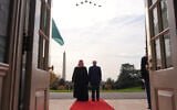 US President Donald Trump (right) and Saudi Arabia's Crown Prince Mohammed bin Salman watch F-35s and F-15s fly over during a welcome ceremony on the South Lawn of the White House, November 18, 2025, in Washington. (AP/Evan Vucci)