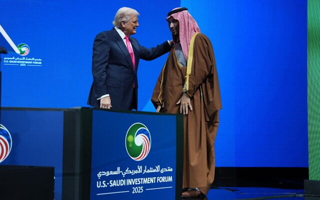 US President Donald Trump speaks with Saudi Arabia's Crown Prince Mohammed bin Salman during the Saudi Investment Forum at the Kennedy Center,  in Washington, November 19, 2025. (Evan Vucci/AP)