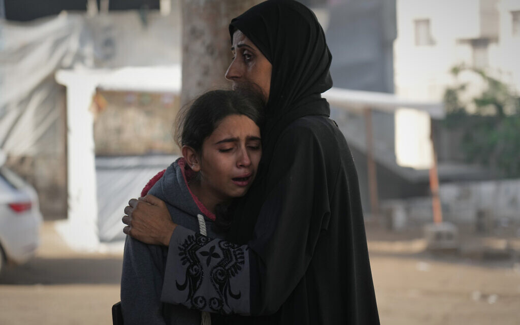 Palestinians mourn their relatives killed in an Israeli strike, at Shifa Hospital in Gaza City, November 20, 2025. (AP Photo/Jehad Alshrafi) Palestinians mourn their relatives killed in an Israeli strike, at Shifa Hospital in Gaza City, November 20, 2025. (AP Photo/Jehad Alshrafi)