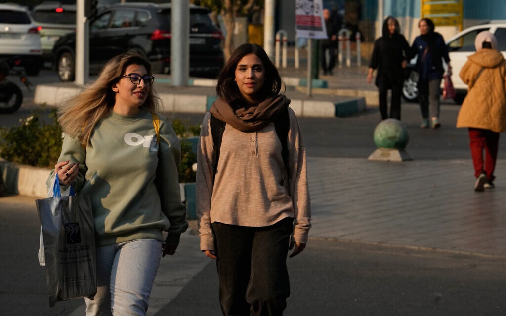 Women cross an intersection in downtown Tehran, Iran, November 20, 2025. (AP Photo/Vahid Salemi) Women cross an intersection in downtown Tehran, Iran, November 20, 2025. (AP Photo/Vahid Salemi)