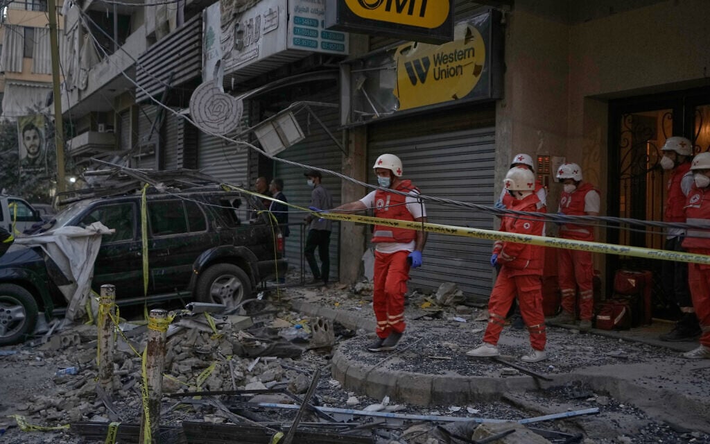 Lebanese Red Cross volunteers work at the site where an apartment building was hit during an Israeli airstrike in the southern suburb of Beirut, on November 23, 2025. (AP Photo/Bilal Hussein) Lebanese Red Cross volunteers work at the site where an apartment building was hit during an Israeli airstrike in the southern suburb of Beirut, on November 23, 2025. (AP Photo/Bilal Hussein)