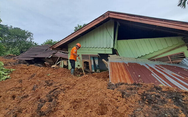 Rescuers search for victims at a village hit by a landslide in Batu Goading, North Sumatra, Indonesia, in an image published on November 29, 2025. (BASARNAS via AP) Rescuers search for victims at a village hit by a landslide in Batu Goading, North Sumatra, Indonesia, in an image published on November 29, 2025. (BASARNAS via AP)