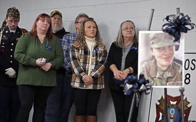 People gather for a vigil in honor of National Guard member Specialist Sarah Beckstrom, one of two National Guard members who were shot in Washington on Wednesday, in Webster Springs, West Virginia, Nov. 28, 2025. (AP Photo/Kathleen Batten) People gather for a vigil in honor of National Guard member Specialist Sarah Beckstrom, one of two National Guard members who were shot in Washington on Wednesday, in Webster Springs, West Virginia, Nov. 28, 2025. (AP Photo/Kathleen Batten)