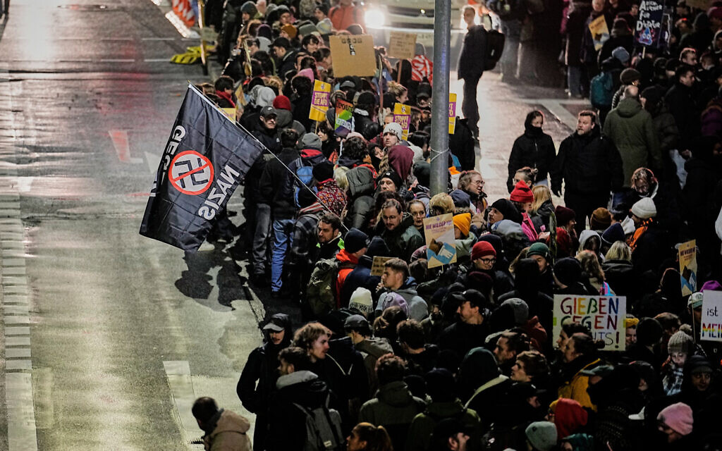 People demonstrate against the planned re-founding of the AfD youth organization in Giessen, Germany, early Saturday, Nov. 29, 2025. (AP Photo/Martin Meissner) People demonstrate against the planned re-founding of the AfD youth organization in Giessen, Germany, early Saturday, Nov. 29, 2025. (AP Photo/Martin Meissner)