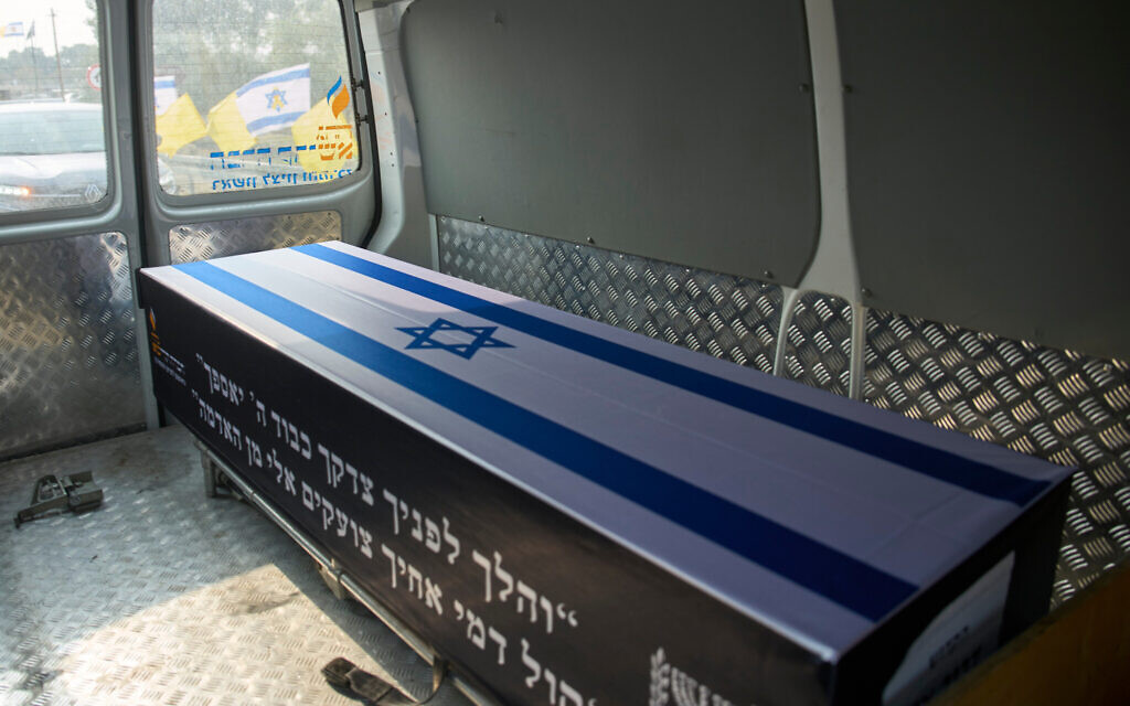 The coffin of slain hostage Dror Or is transported to Kibbutz Be'eri, Nov. 30, 2025. (AP Photo/Ohad Zwigenberg) The coffin of slain hostage Dror Or is transported to Kibbutz Be'eri, Nov. 30, 2025. (AP Photo/Ohad Zwigenberg)