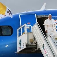 Pope Leo XIV arrives at Beirut's international airport in Lebanon on November 30, 2025. (AP Photo/ Domenico Stinellis)