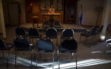 FILE: A rabbinical student reads at the Synagogue of the Black Hills in Rapid City, S.D., September 12, 2014. (AP Photo/Kristina Barker)