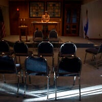 FILE: A rabbinical student reads at the Synagogue of the Black Hills in Rapid City, S.D., September 12, 2014. (AP Photo/Kristina Barker)