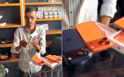 In an undated video, ostensibly from the Gaza Strip, a man shows off new iPhone 17s at a shop (Video screenshot/social media)