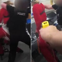 Bodycam footage from August 6, 2024, shows an officer aiming a taser gun at an intruder at Elbit UK's site in Bristol, England, after the intruder struck a police officer with a sledgehammer. (Screen capture: Channel 4)