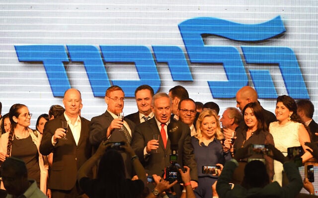 Prime Minister Benjamin Netanyahu, center, with his wife and Likud party MKs at a Likud Central Committee gathering, toast the Jewish new year in Tel Aviv, September 6, 2018. (Gili Yaari/FLASH90) Prime Minister Benjamin Netanyahu, center, with his wife and Likud party MKs at a Likud Central Committee gathering, toast the Jewish new year in Tel Aviv, September 6, 2018. (Gili Yaari/FLASH90)