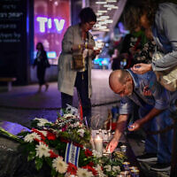 People visit the monument site for assassinated prime minister Yitzhak Rabin, at Rabin Square in Tel Aviv on November 4, 2024. (Tomer Neuberg/Flash90)