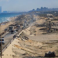 Palestinians seen along the Gaza City seafront, following the ceasefire agreement between Hamas and Israel, October 18, 2025 (Ali Hassan/Flash90)