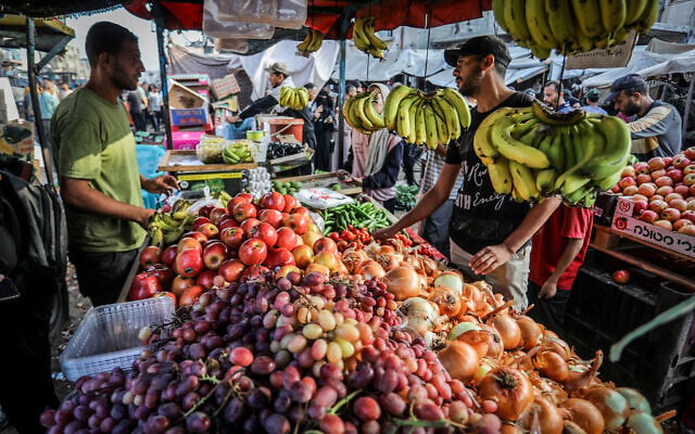 Palestinian markets are crowded with people as life returns to normal in Khan Younis, in the southern Gaza Strip, in an undated photo from October 2025 following the start of a ceasefire between Israel and Hamas. (Abed Rahim Khatib/Flash90) Palestinian markets are crowded with people as life returns to normal in Khan Younis, in the southern Gaza Strip, in an undated photo from October 2025 following the start of a ceasefire between Israel and Hamas. (Abed Rahim Khatib/Flash90)