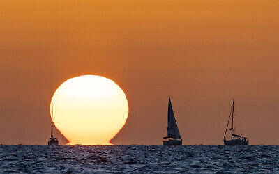 Illustrative: Sunset seen off the coast of Herzliya, October 25, 2025. (Yonatan Sindel/Flash90)