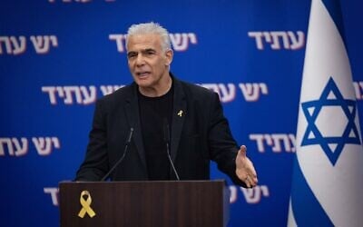 Opposition leader and Yesh Atid chair Yair Lapid leads a faction meeting at the Knesset in Jerusalem, October 27, 2025. (Yonatan Sindel/Flash90)