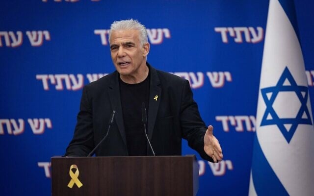 Opposition leader and Yesh Atid chair Yair Lapid leads a faction meeting at the Knesset, the Israeli parliament in Jerusalem, on October 27, 2025. (Yonatan Sindel/Flash90)