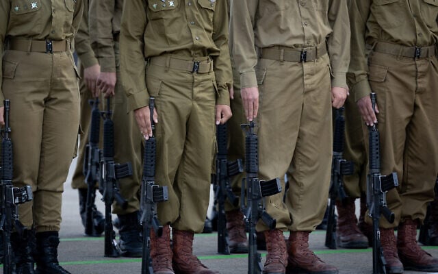 Soldiers attend an IDF officers course graduation ceremony, October 30, 2025. (Noam Revkin Fenton/Flash90)