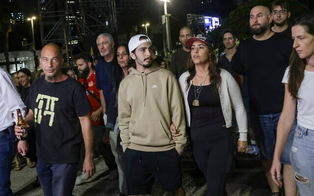 Freed captive Matan Zangauker arrives at a rally being held at Hostage Squares in Tel Aviv on November 1, 2025. (Miriam Alster/Flash90) Freed captive Matan Zangauker arrives at a rally being held at Hostage Squares in Tel Aviv on November 1, 2025. (Miriam Alster/Flash90)