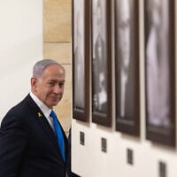 Prime Minister Benjamin Netanyahu is seen in the hallways of the Knesset on November 3, 2025. (Chaim Goldberg/FLASH90)