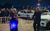 Israeli security forces at the scene of a shooting in which one man was killed, in Tel Aviv, November 8, 2025. (Yehoshua Yosef/Flash90)