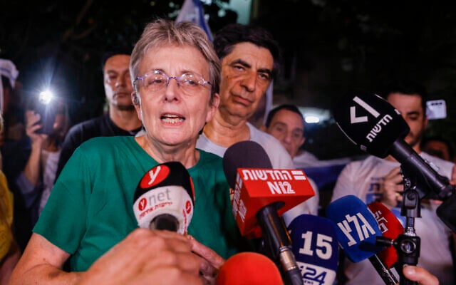 Leah and Simcha Goldin, parents of fallen soldier Hadar Goldin, offer a statement after the return of their son's body from Hamas captivity in Gaza, outside their Kfar Saba home on November 9, 2025 (Yehoshua Yosef/Flash90)
