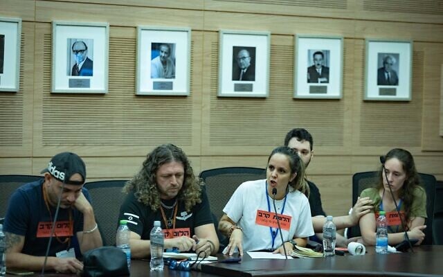 Former soldiers who are suffering from PTSD speak during a Foreign Affairs and Defense Committee meeting at the Knesset, the Israeli Parliament in Jerusalem, November 10, 2025. (Yonatan Sindel/Flash90) Former soldiers who are suffering from PTSD speak during a Foreign Affairs and Defense Committee meeting at the Knesset, the Israeli Parliament in Jerusalem, November 10, 2025. (Yonatan Sindel/Flash90)
