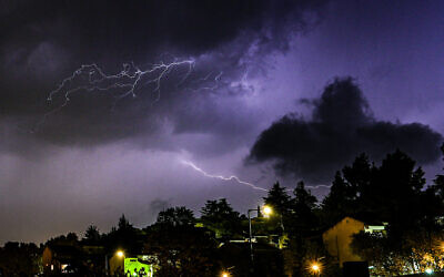 Lightning illuminates the sky over the Upper Galilee, during a storm on November 13, 2025. (Ayal Margolin/Flash90)