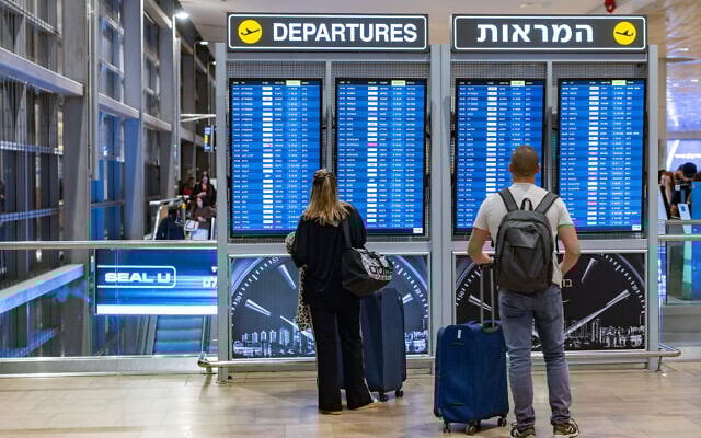 Travelers at Ben Gurion International Airport, October 23, 2025. (Nati Shohat/Flash90)