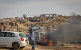 Israeli security forces clash with settlers during the evacuation of the illegal outpost of Tzur Misgavi, in the Gush Etzion area of the West Bank, November 17, 2025. (Chaim Goldberg/Flash90)