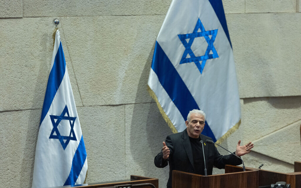 Opposition Leader Yair Lapid speaks during a plenum session at the Knesset in Jerusalem, November 19, 2025 (Yonatan Sindel/Flash90)