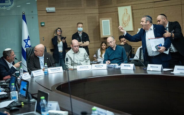 MK Gilad Kariv argues with National Security Minister Itamar Ben Gvir during a committee meeting at the Knesset on November 19, 2025 (Yonatan Sindel/Flash90)