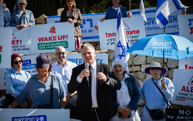 Minister of Education Yoav Kisch attends a demonstration calling for Israeli sovereignty over the West Bank and opposing a Palestinian state, outside the weekly cabinet meeting at the Prime Minister’s Office in Jerusalem, November 23, 2025. (Yonatan Sindel/Flash90) Minister of Education Yoav Kisch attends a demonstration calling for Israeli sovereignty over the West Bank and opposing a Palestinian state, outside the weekly cabinet meeting at the Prime Minister’s Office in Jerusalem, November 23, 2025. (Yonatan Sindel/Flash90)