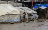 A flooded street after a rainstorm in Khan Younis, in the southern Gaza Strip, amid a ceasefire, November 25, 2025. (Abed Rahim Khatib/Flash90)
