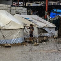 A flooded street after a rainstorm in Khan Younis, in the southern Gaza Strip, amid a ceasefire, November 25, 2025. (Abed Rahim Khatib/Flash90)