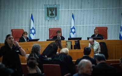 Supreme Court President Isaac Amit arrives for a court hearing on petitions against the appointment of retired judge Yosef Ben-Hamo to lead the probe into the Sde Teiman abuse leak, at the High Court of Justice in Jerusalem, November 27, 2025. (Yonatan Sindel/Flash90)