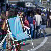 Thousands of people wait in line to schedule an appointment at the Portuguese Embassy in Israel, in central Israel, November 28, 2025. (Tal Gal/Flash90)