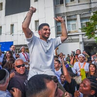 Former hostage Yosef-Chaim Ohana arrives at his home in Kiryat Malachi, November 30, 2025. (Yossi Aloni/Flash90)