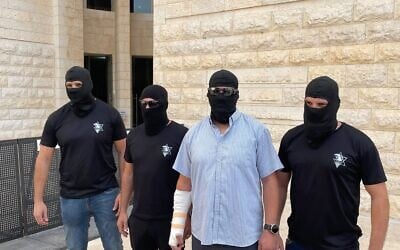 Reserve soldiers indicted for abusing a Palestinian security detainee at the Sde Teiman military detention center speak to the media outside the Supreme Court in Jerusalem on November 2, 2025 (Jeremy Sharon/ Times of Israel)