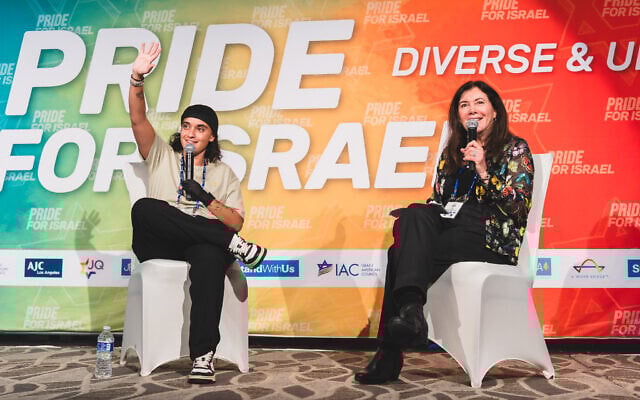 Former hostage Emily Damari, left, and StandWithUs CEO Roz Rothstein speak during a panel at the inaugural Pride for Israel conference in West Los Angeles, California, November 9, 2025. (StandWithUs)
