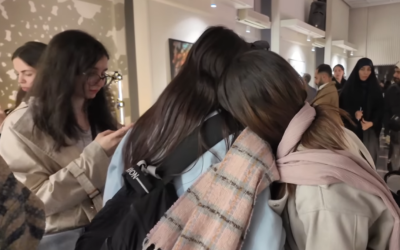 A screengrab of a video showing unveiled women attending an art show at Tehran Design Week, released November 14, 2025. (YouTube)