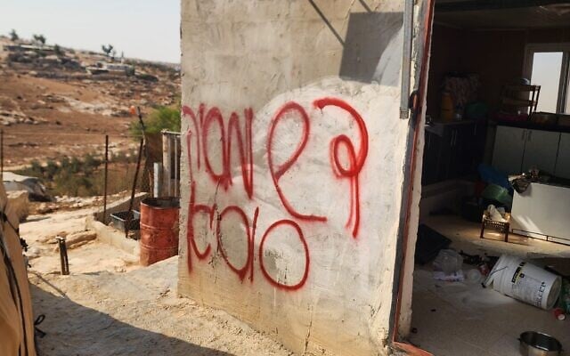 Hebrew graffiti reading “Regards from the Susya harvest” is seen on a house in Shaab al-Butum, in the South Hebron Hills, where an elderly Palestinian was reportedly attacked by settlers, on November 5, 2025. (Courtesy) Hebrew graffiti reading “Regards from the Susya harvest” is seen on a house in Shaab al-Butum, in the South Hebron Hills, where an elderly Palestinian was reportedly attacked by settlers, on November 5, 2025. (Courtesy)
