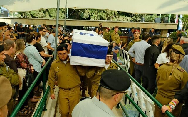 Soldiers carry the coffin of Staff Sgt. Oz Daniel, whose body was returned from Gaza, at the Kfar Saba Military Cemetery on November 6, 2025 (Adar Eyal/Hostages Forum) Soldiers carry the coffin of Staff Sgt. Oz Daniel, whose body was returned from Gaza, at the Kfar Saba Military Cemetery on November 6, 2025 (Adar Eyal/Hostages Forum)