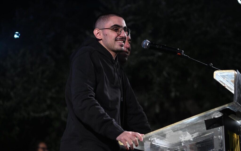 Freed hostage Rom Braslavski addresses a rally at Hostages Square in Tel Aviv calling for the release of the remaining, deceased hostages held by Hamas, November 8, 2025. (Lior Rotstein/Hostages and Missing Families Forum)