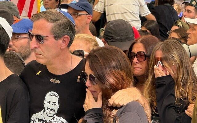 Hagit (R) and Ruby Chen at the funeral of their son, slain hostage soldier Itay Chen, at the Kiryat Shaul Military Cemetery in Tel Aviv, November 9, 2025. (Shai Hazan/Israeli Pro-Democracy Protest Movement)