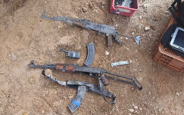 Hamas weapons found at Kibbutz Be'eri in an image released on November 12, 2025 (Israel Police)